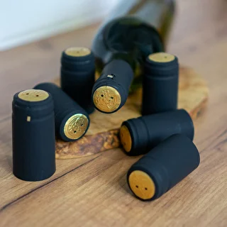 Capuchones con perforación negros fi31mm 100uds. – photo 2